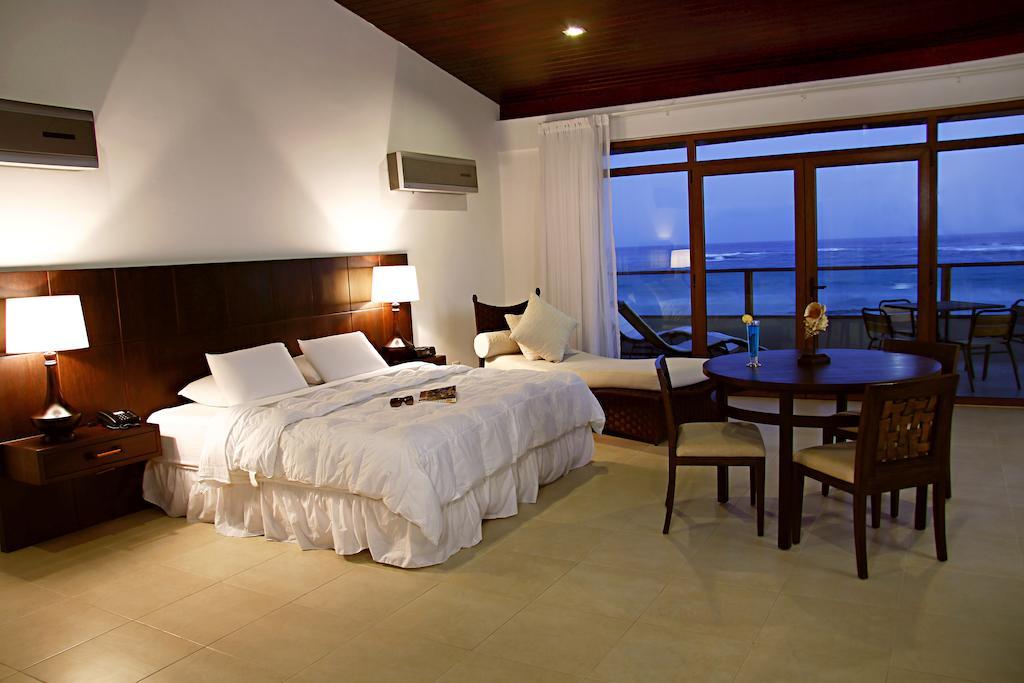 Iguana Crossing Boutique Hotel Puerto Villamil Værelse billede