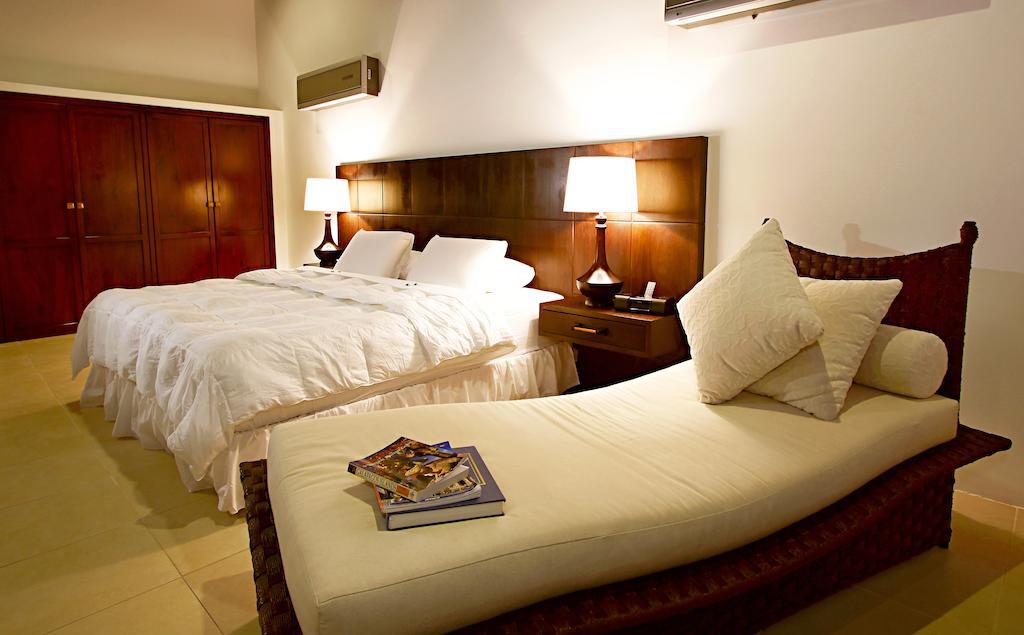 Iguana Crossing Boutique Hotel Puerto Villamil Værelse billede